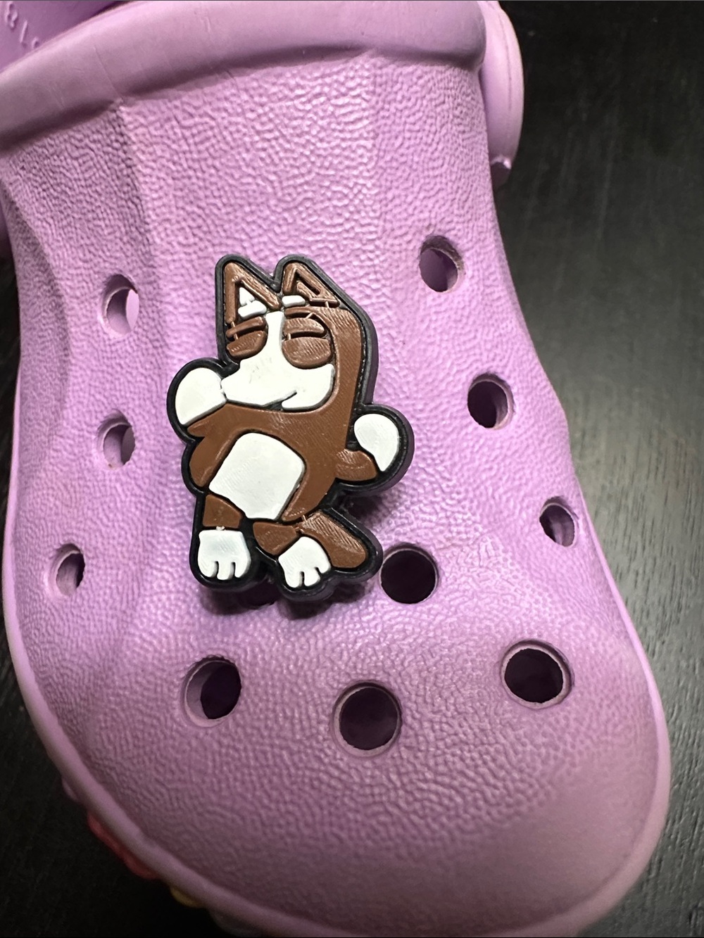 Cartoon shoe charm.